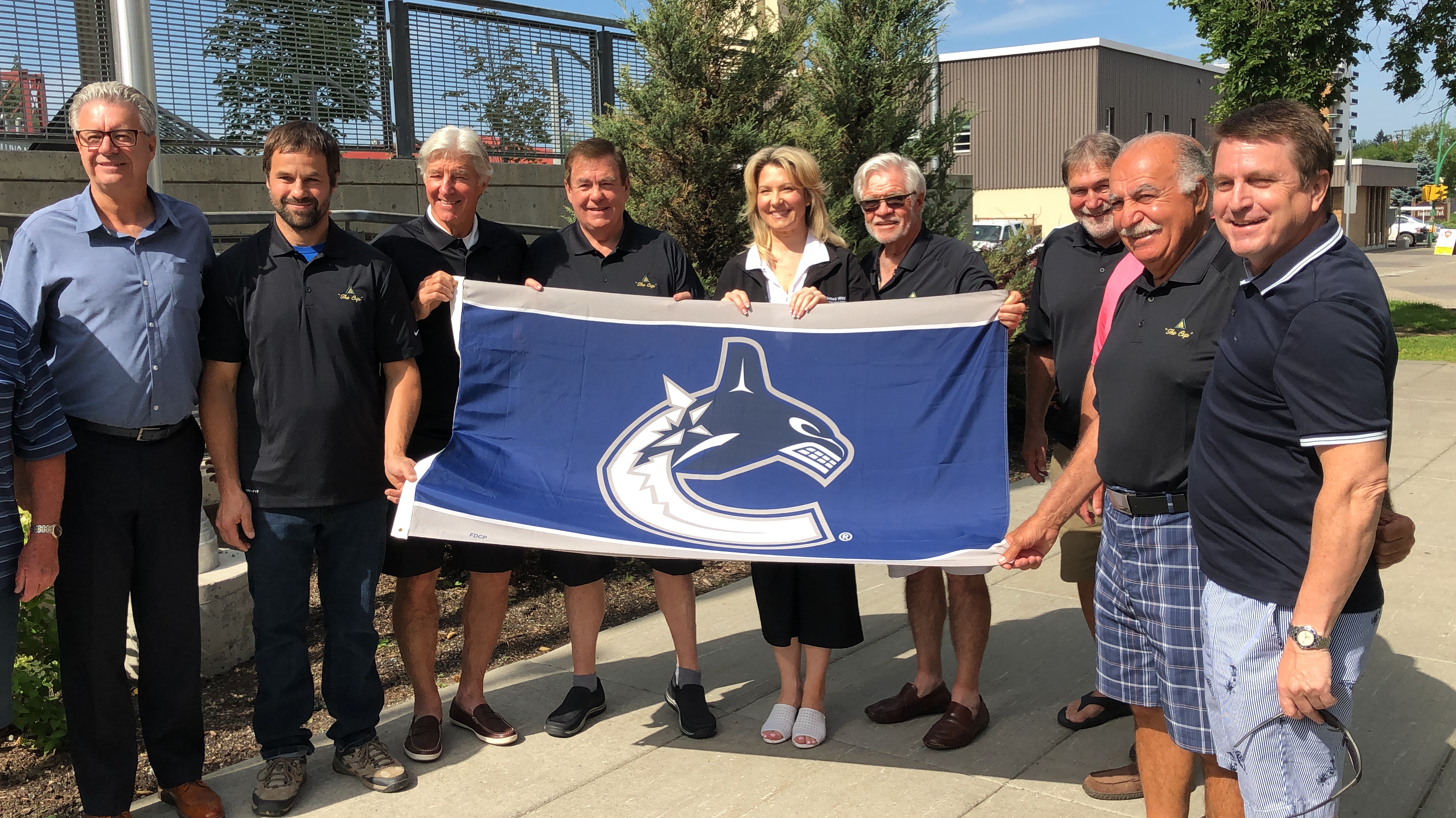 canucks golf shirt